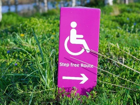 pink accessibility signage