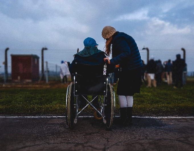 helping someone in a wheelchair
