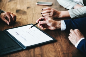 business people reviewing tablet