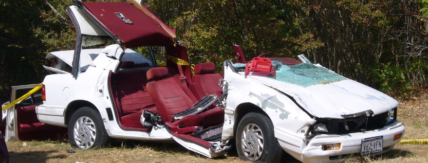 car-crash-injury-care-benefits-icbc-enhanced-care Crashed car with hood torn off