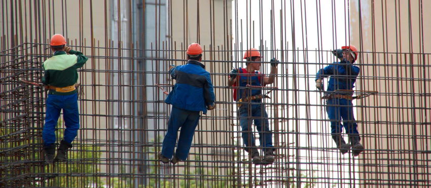 workers hanging from rebar